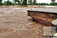 สุโขทัย-น้ำท่วมอำเภอเมืองยังอ่วม ถนนขาด